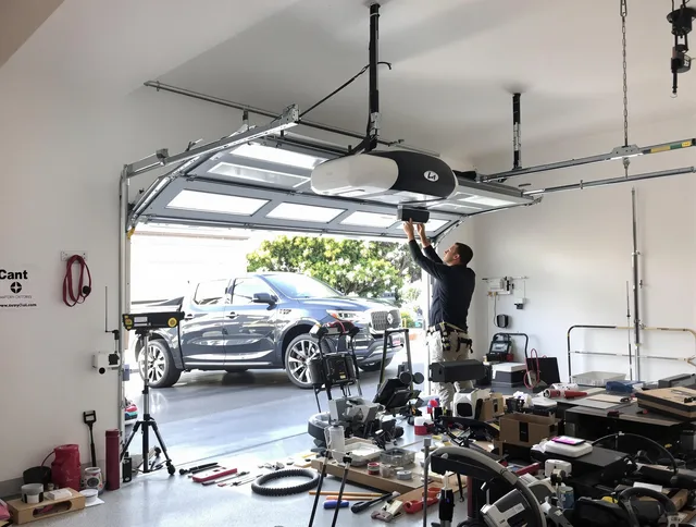 Lake Wylie Garage Door Repair specialist installing smart garage door opener system in Lake Wylie home