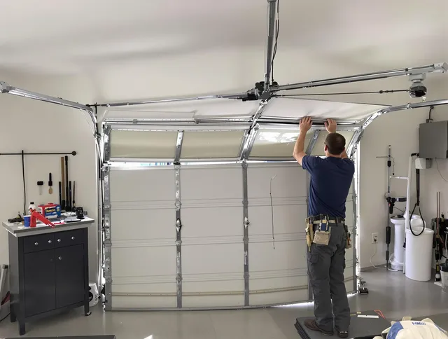 Lake Wylie Garage Door Repair specialist performing precise section replacement on Lake Wylie garage door